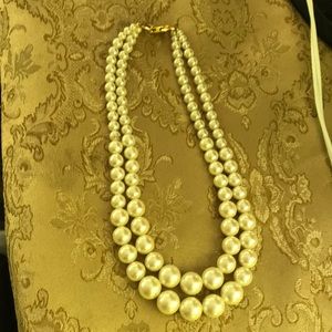 Costume double strand pearl( not real pearls.)